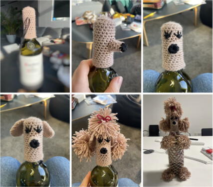 A series of six images showing a poodle wine bottle cover being made: a plain pink knitted covering on the neck of a wine bottle, a knitted and stuffed nose is added, eyes are embroidered on, two knitted ears are sewn on, poofy hair with a red bow is attached to the top of the head, the complete poodle wine bottle cover